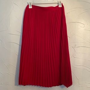 Red pleated skirt